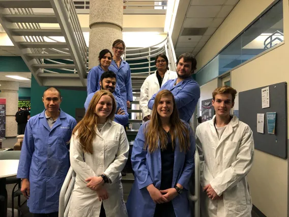 Group in lab uniforms